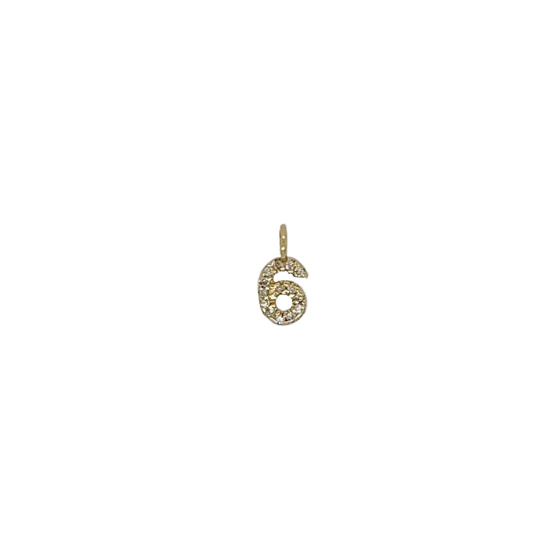 A perfect charm to add onto any chain or bracelet. Cast in 14kt yellow gold adorned with 11 round cut diamonds.