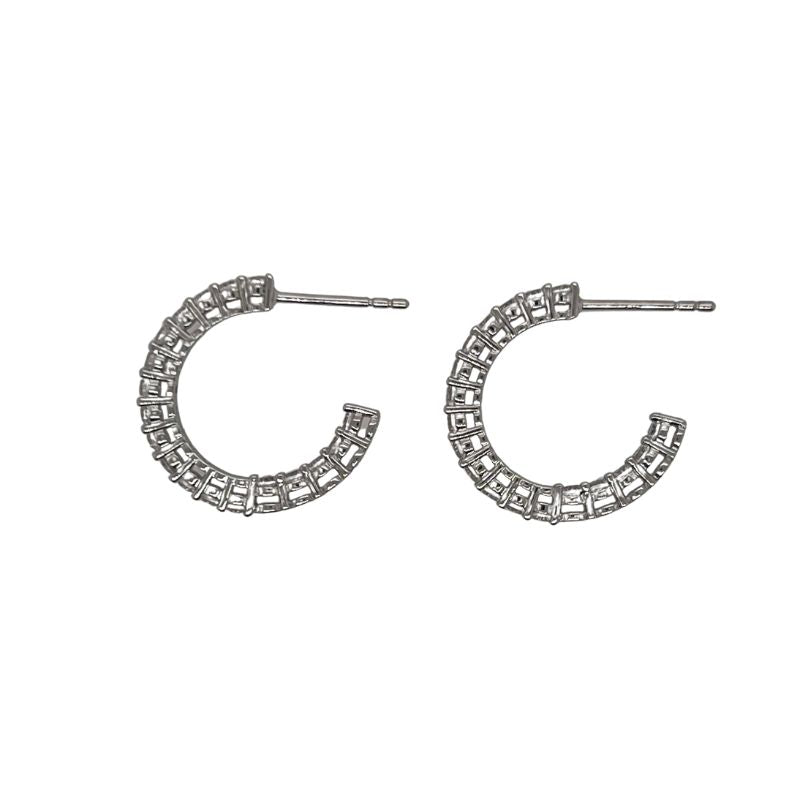 These round crystal studded style hoop earrings are available in either sterling silver or 14 kt yellow gold vermeil.&nbsp;