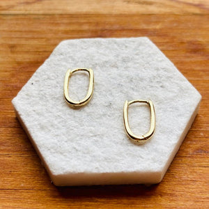 
                  
                    Load image into Gallery viewer, These 14kt yellow gold Arlo Huggies are so dainty and cute! They are perfect for wearing on their own or for stacking on your ears!
                  
                