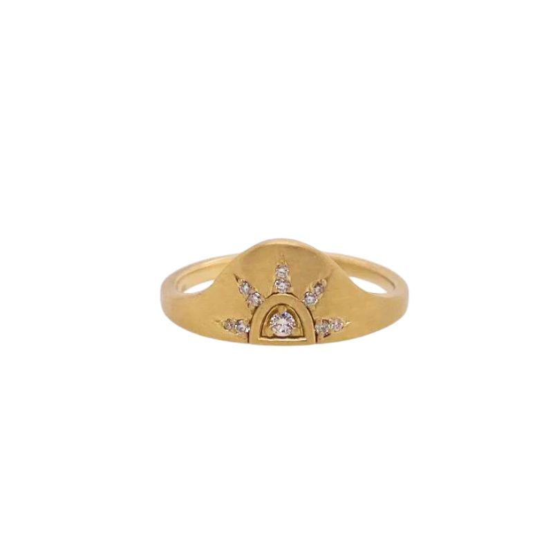 A seamless matte 14kt yellow gold band adorned with diamond sun rays. A statement all on its own or can spice up any stack.