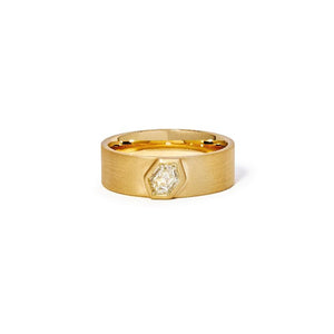 
                  
                    Load image into Gallery viewer, A hexagon cut diamond is beautifully set into a 7mm 14kt yellow gold band.
                  
                