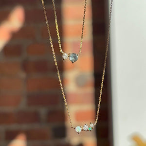 
                  
                    Load image into Gallery viewer, Our stardust necklace is cast in 14 kt gold. Choose from one of our current 5 stone variations we currently offer.
                  
                