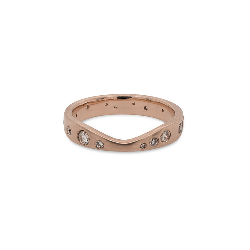 
                  
                    Load image into Gallery viewer, This 14 kt gold shadow band is adorned with 23 round cut white diamonds. The unique curvature of this ring allows it to rest perfectly against several of our gemstone rings. A beautiful complement to an engagement ring, yet looks amazing when worn by itself as well.
                  
                