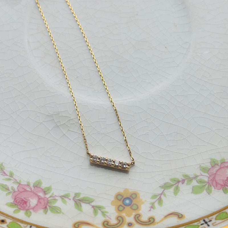 
                  
                    Load image into Gallery viewer, Both simple and modern, this&amp;nbsp;bar necklace boasts five round cut diamonds, or opt for it with pink tourmaline. This piece looks great both dressed up or down. A versatile necklace for any occasion.
                  
                