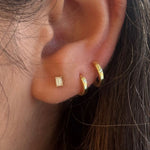 Sleek diamond emerald cut studs, set in 14kt white and yellow gold