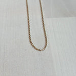 This 14 kt solid yellow gold chain is adjustable 16"to 18". Perfect to pair with one of our charms or pendants.