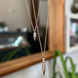 
                  
                    Load image into Gallery viewer, Albeit simple in design, our 14 kt gold spike diamond necklace makes a big statement. A truly lovely piece that you will adorn for years to come.
                  
                