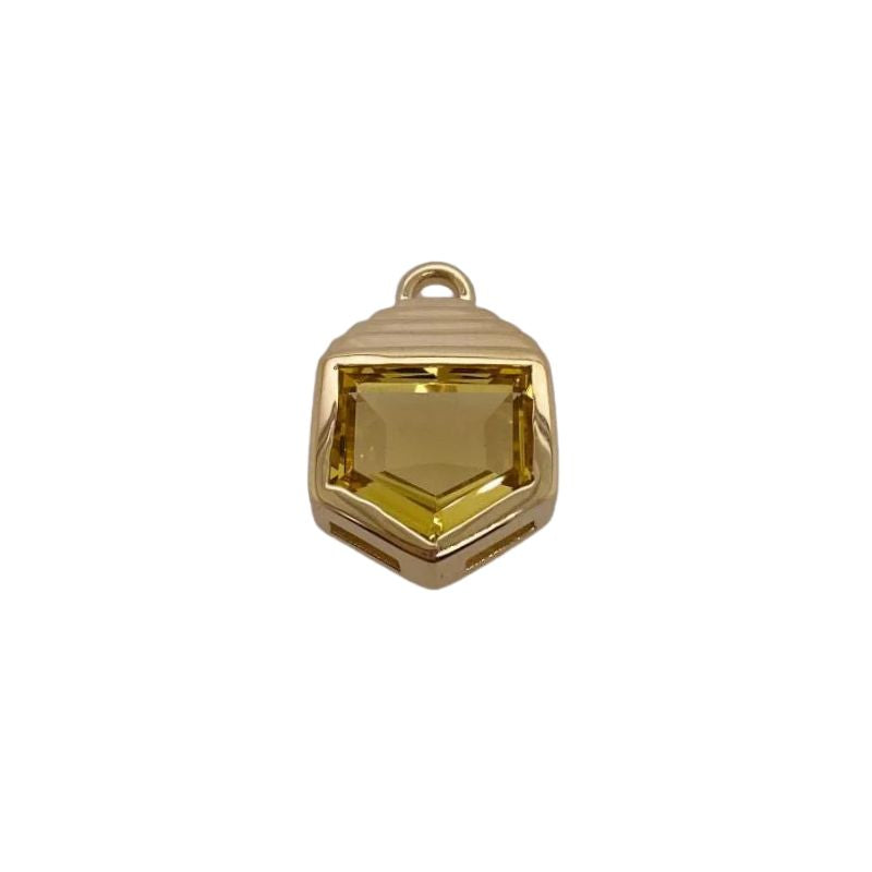 Casted in 14 kt gold, this shield or bullet cut pendant makes a statement on its own or can add the right touch to a layered look.