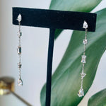 These gorgeous drop earrings have baguette, pear, square and round shaped crystals. They are available in sterling silver and 14kt yellow gold vermeil.