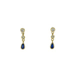 A classy and delicate pair of earrings for any occasion. With two round and one pear crystal, these dangling studs will catch the light and shine bright. Available 14kt yellow gold vermeil. All stones are genuine crystals.