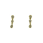 A classy and delicate pair of earrings for any occasion. With two round and one pear crystal, these dangling studs will catch the light and shine bright. Available 14kt yellow gold vermeil. All stones are genuine crystals.