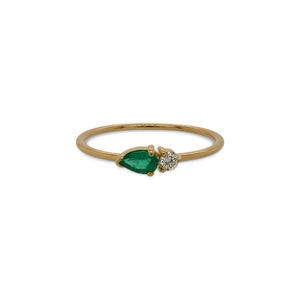 
                  
                    Load image into Gallery viewer, Front view of pear cut emerald and round diamond ring cast in 14 kt yellow gold.
                  
                